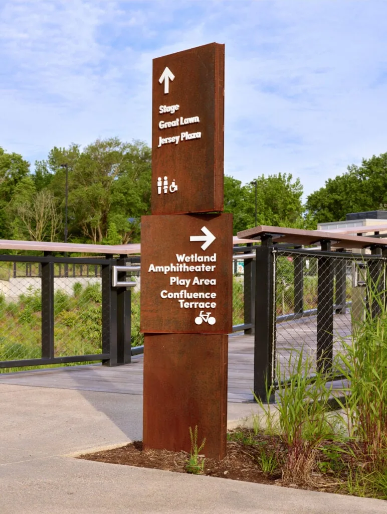 Stacked metal directional signage